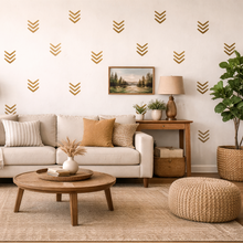 Cozy living room with beige sofa, wooden coffee table, and decorative elements.