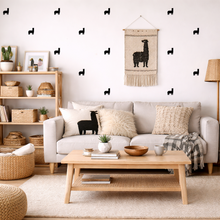Cozy living room with a gray sofa, wooden coffee table, and decorative items.